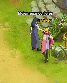 mujer regando flores